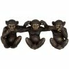 Côté Table Trio singes Sanaga noir doré 70x17x20cm Couleur Noir et doré